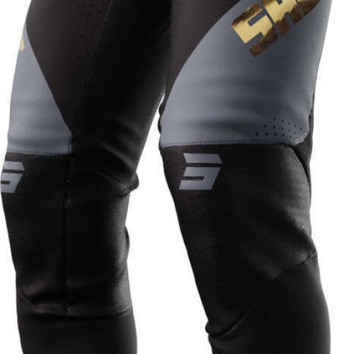 PANTALON SHOT AEROLITE HONOR NEGRO ORO