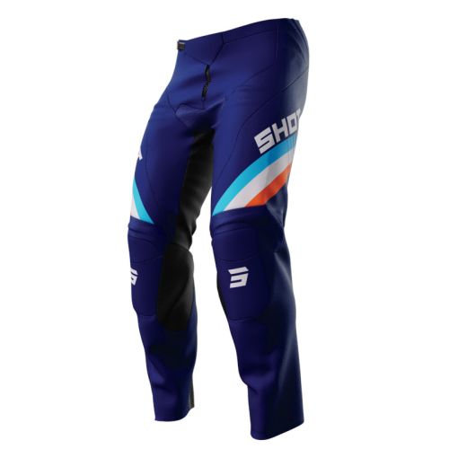 PANTALON SHOT KID TRACER AZUL/NARANJA
